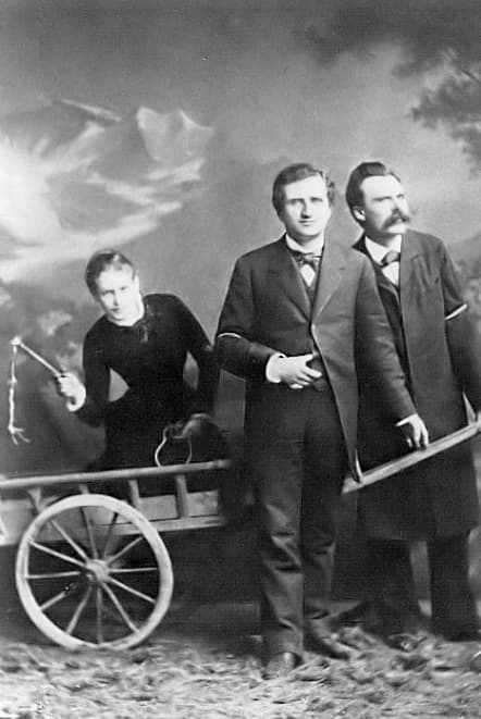 Lou Salomé in a cart, Paul Rée and Friedrich Nietzsche posing in front of her in Lucerne in 1882