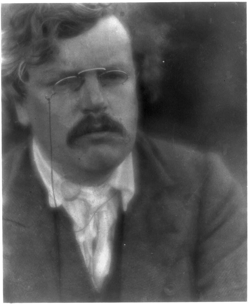 Photographic portrait of G. K. Chesterton around 1905, wearing a pince-nez.