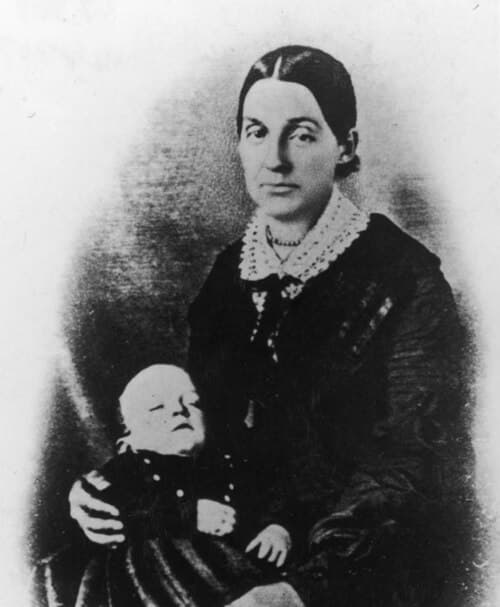 Emma Hale Smith holding a child, old photograph from the RLDS archives