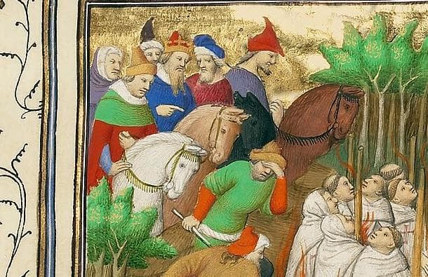 Templariusze w białych płaszczach na stosie