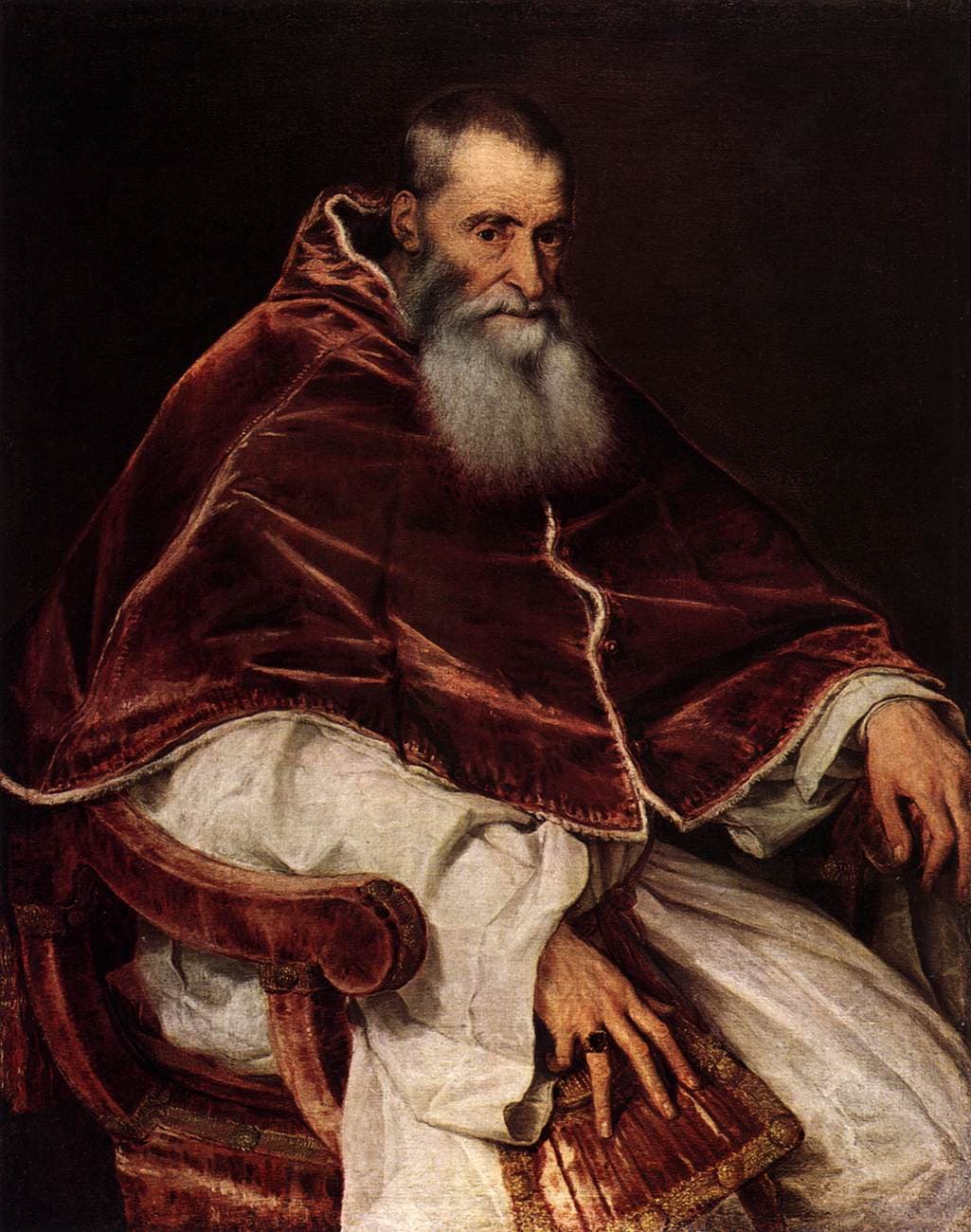 Paul III. sitzend, Porträt gemalt von Tizian 1545–1546.