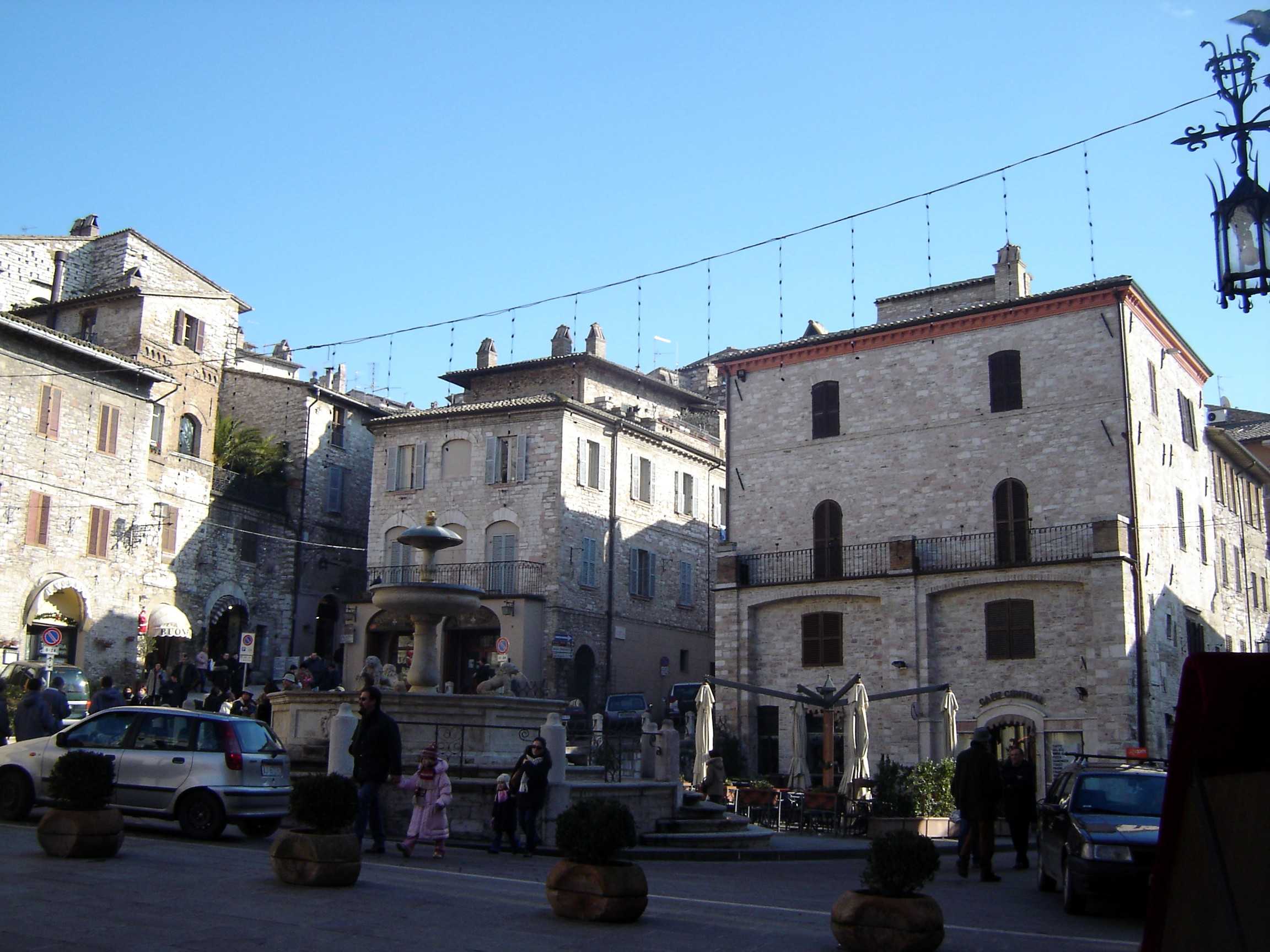 The Piazza del Comune in Assisi with the Roman temple of Minerva