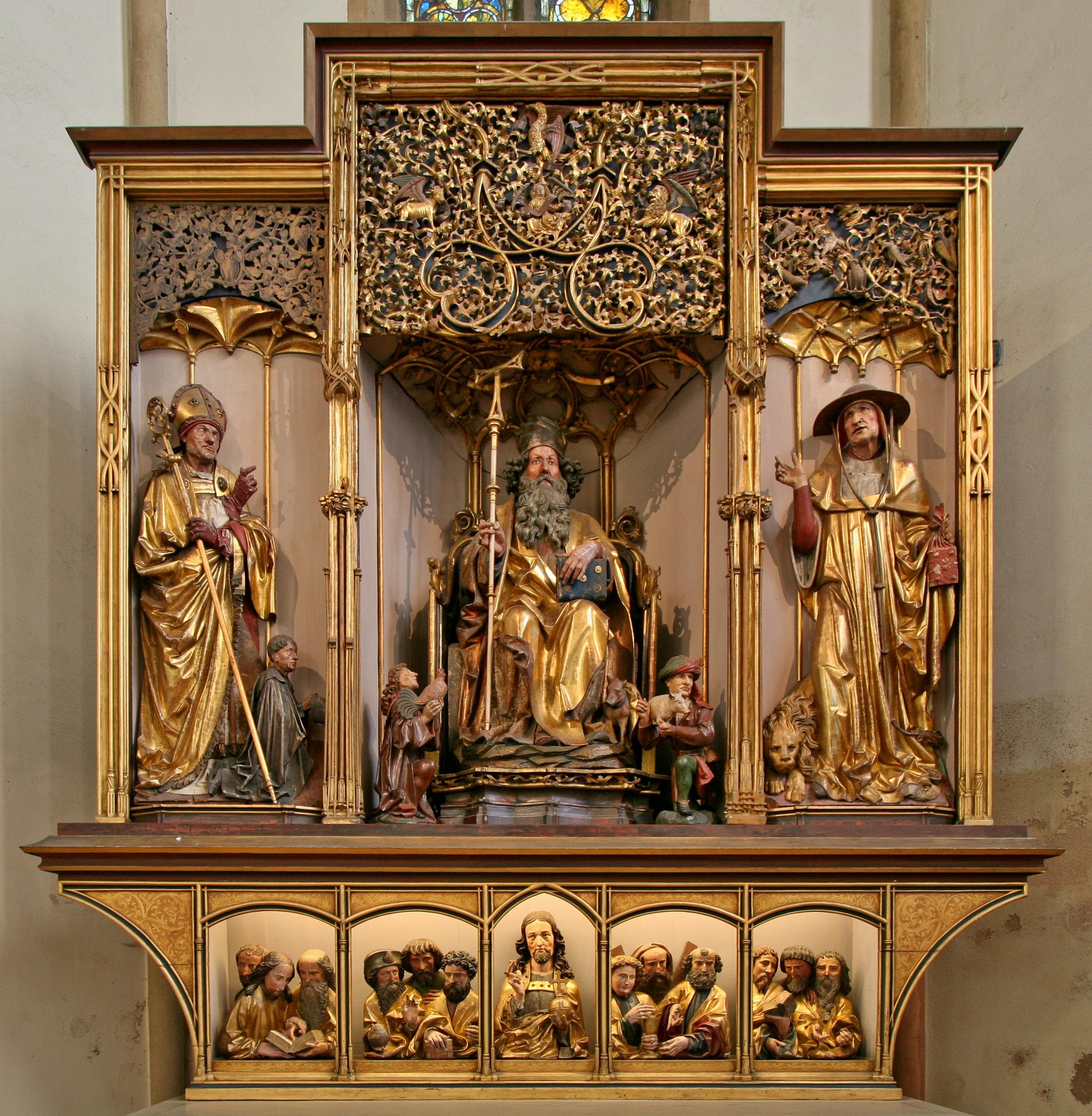 Saint Anthony between Saint Augustine and Saint Jerome, above the carved predella
