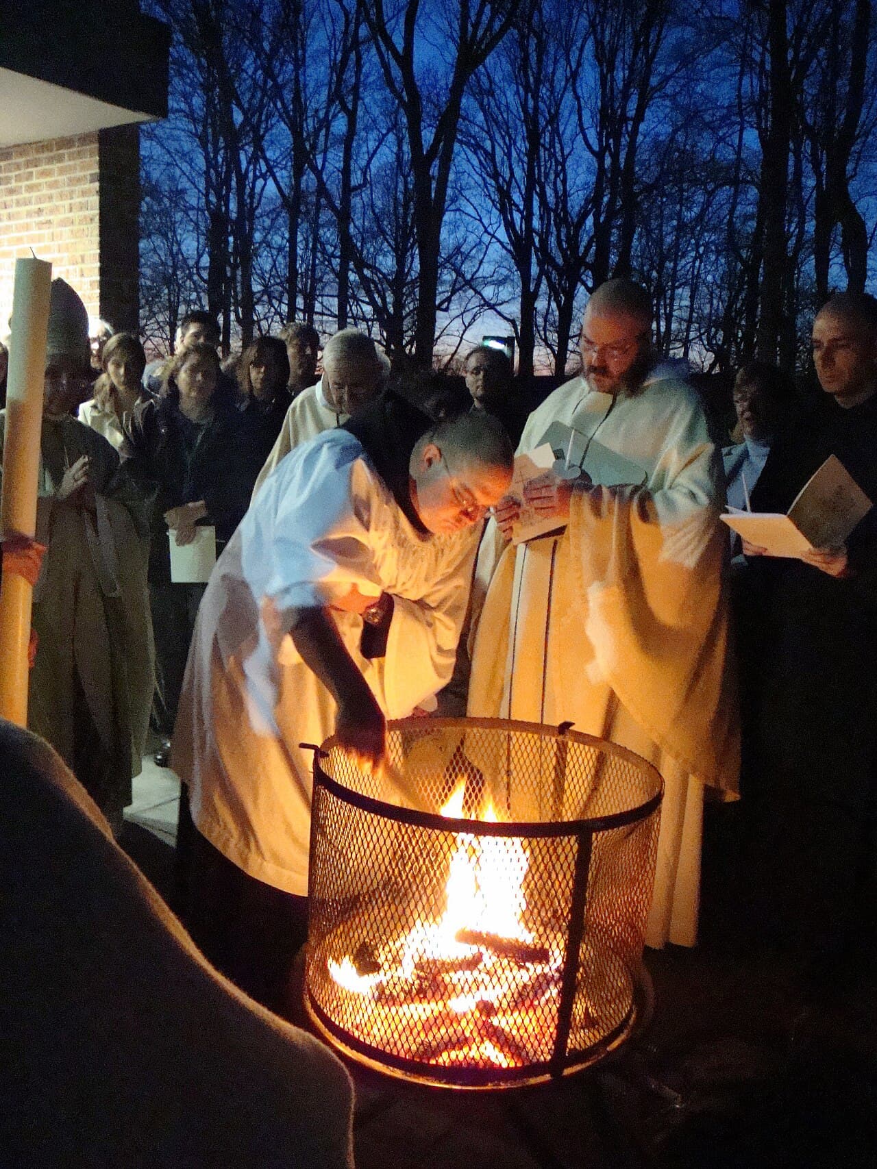 Benedictine monks preparing the paschal candle before the Easter Vigil, Morristown