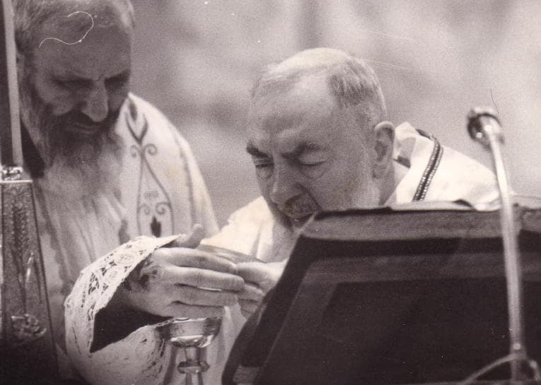 Saint Padre Pio celebrating Mass