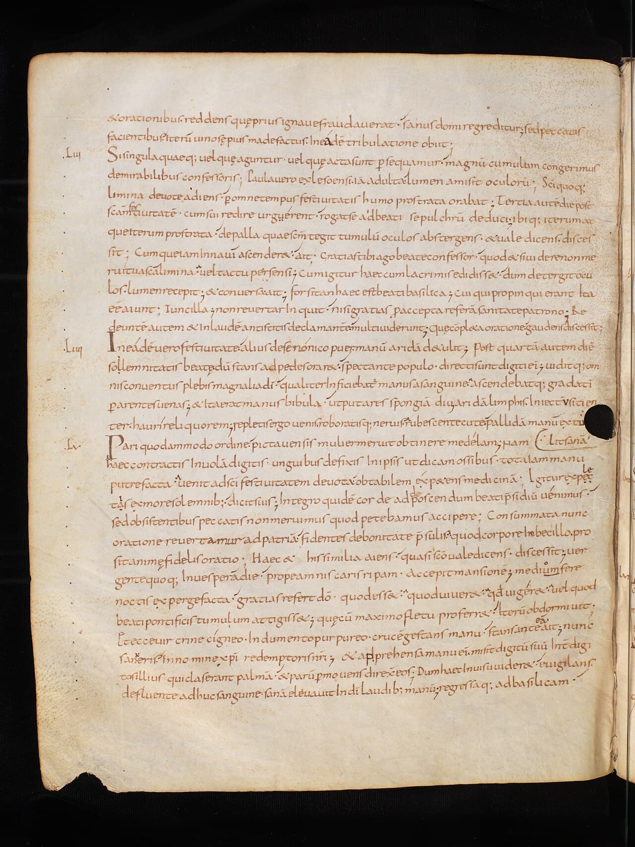 Página de un manuscrito carolingio de vidas latinas de santos