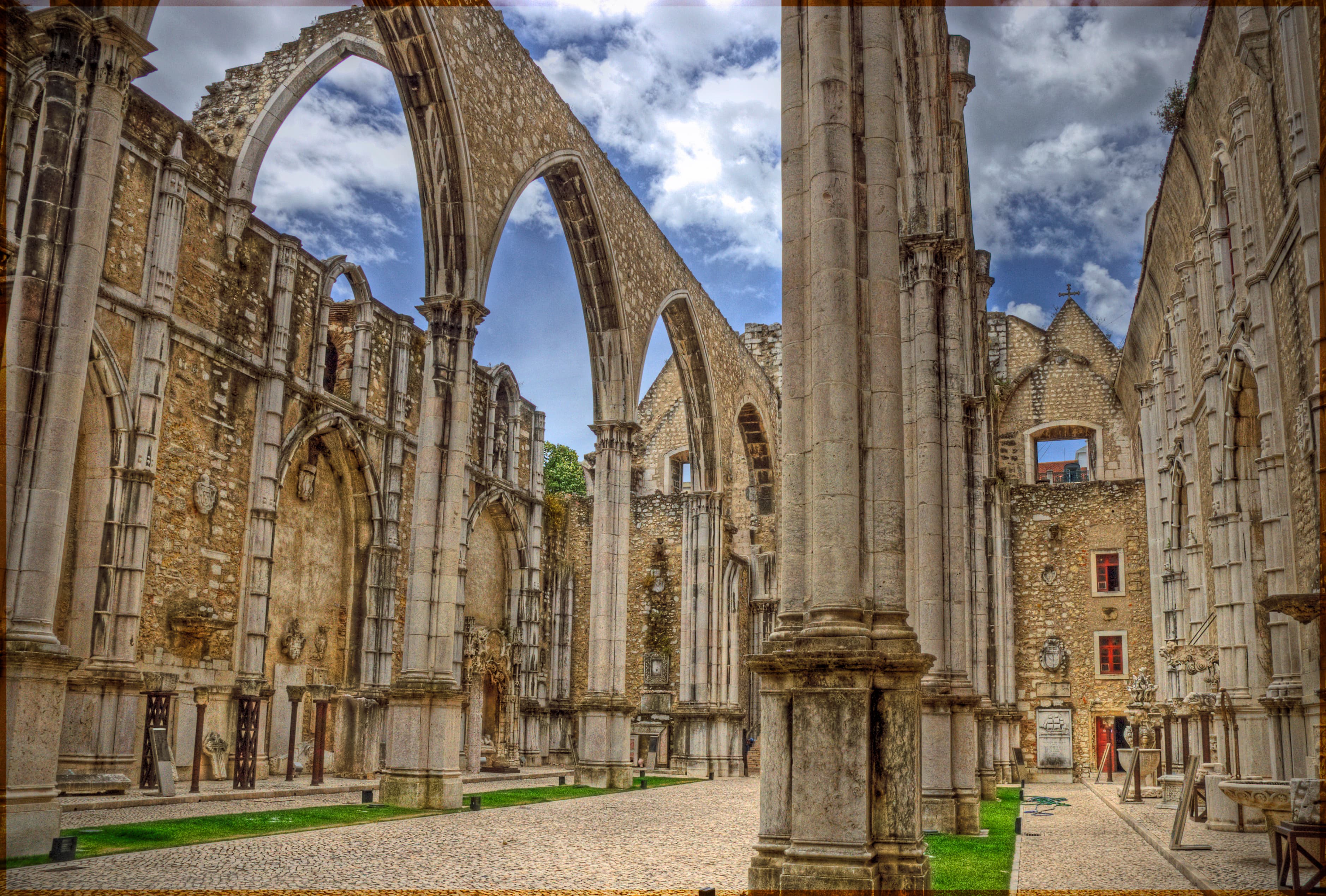 View of the Gothic arcades and the open-air nave of the Carmo convent in Lisbon