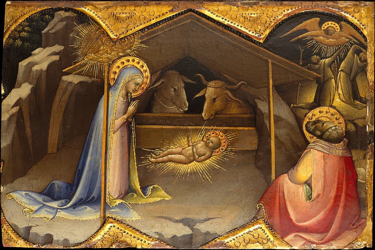 La Natività dipinta da Lorenzo Monaco, con la Vergine inginocchiata in adorazione davanti al Bambino luminoso