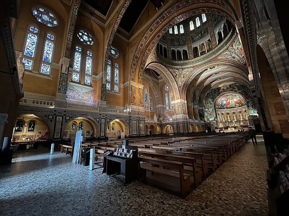 The nave, dome and mosaics of the Basilica of Saint Thérèse